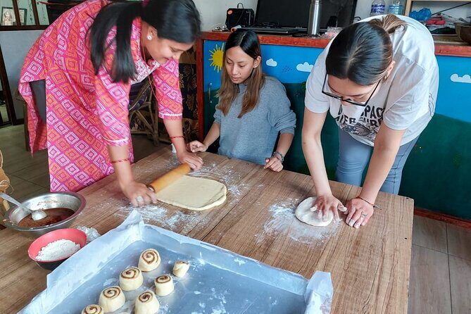 1 day with our women empowerment and children development project - Cooking Dal Bhat or momos with Nepali women (11:00–1:00)