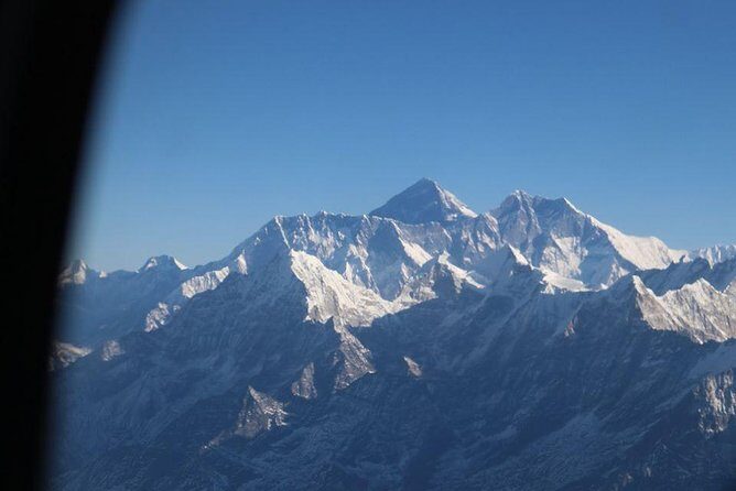 1 Hours Everest Mountain Flight From Kathmandu - Return to Kathmandu: Pickup, Water, and a Private-Group Day