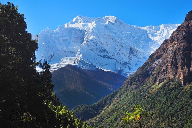 8 Days Private Guided Trekking in Annapurna Circuit with Pickup - Day 2: Dhikur Pokhari forests, Lower Pisang, and the climb into Upper Pisang