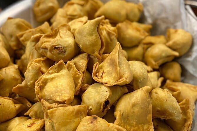 Kathmandu Food Crawl & Market Tour - What you’ll likely taste: momo, chatamari, and sweet stops