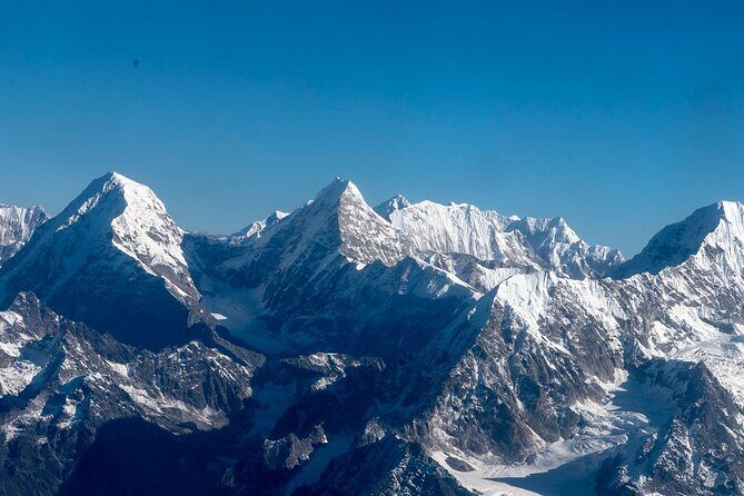 Kathmandu: Mount Everest Scenic Tour by Plane with Transfers - Window seat reality check: sunrise, condensation, and photo tips