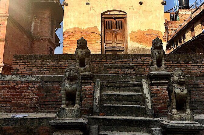 Nagarkot Sunrise & Bhaktapur Heritage Tour -Private Full Day Trip - Bhaktapur Durbar Square: UNESCO buildings, earthquake scars, and street-level atmosphere