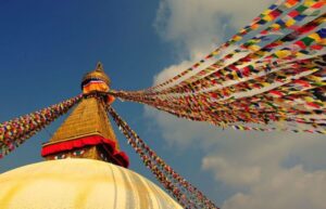 Spiritual Nepal: Expert insight into Multifaith Journey - Boudhanath Stupa: rotating prayer wheels and doing the Kora the local way